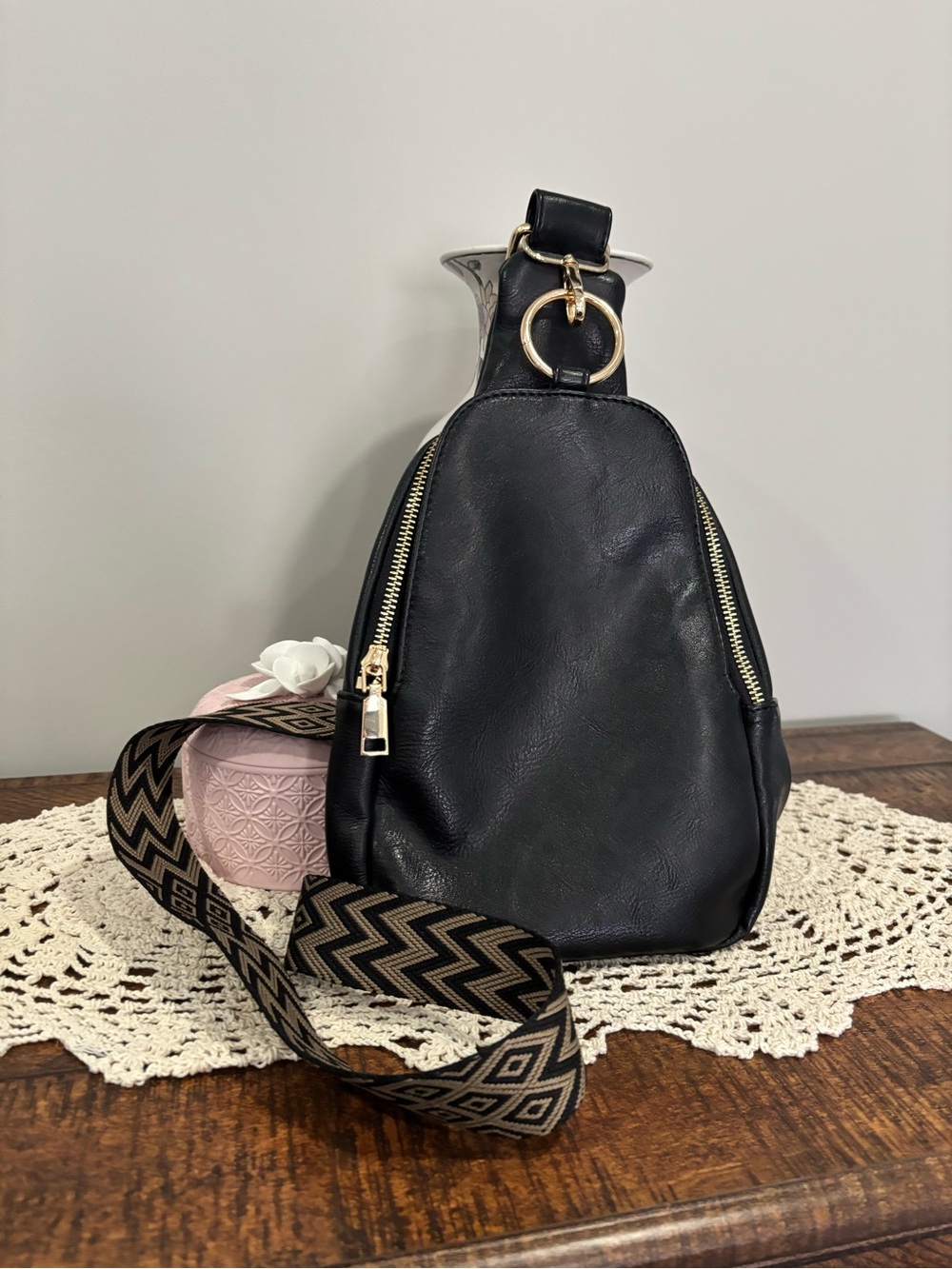 Black Leather Sling Bag with Patterned Adjustable Strap